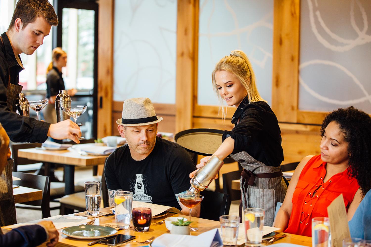 Waiters serving drinks