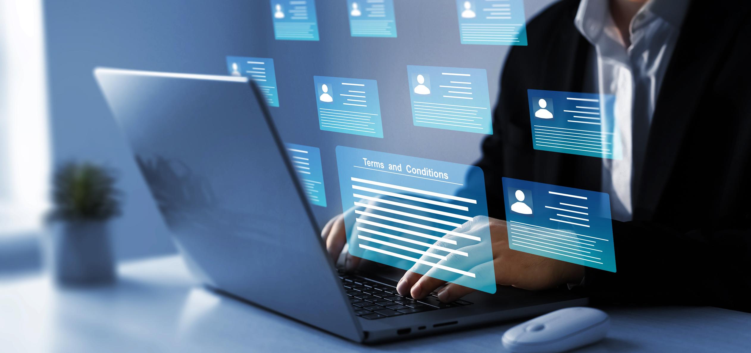 Woman composing emails on a laptop